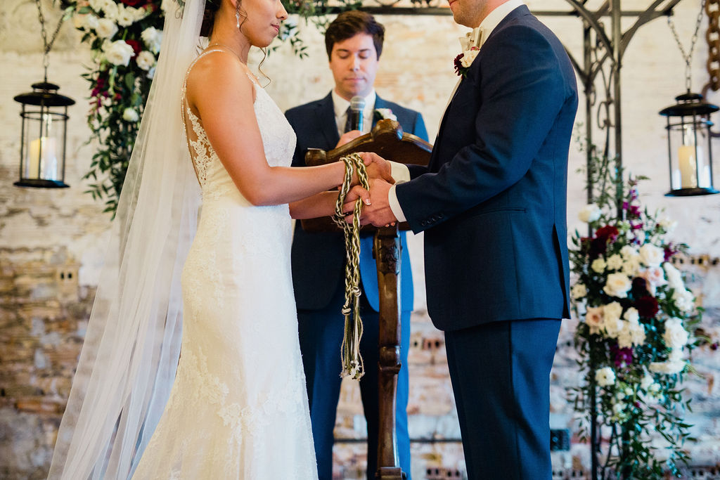 38 knot tieing ceremony rachel desjardins studio wedding story telling moments photography kellermans event center minnesota emotional.jpg