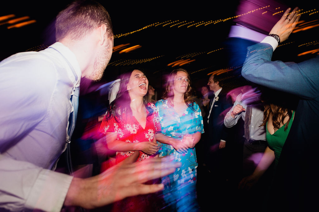 71 dancefloor fun energetic dance ceremony rachel desjardins studio wedding story telling moments photography kellermans event center minnesota emotional.jpg